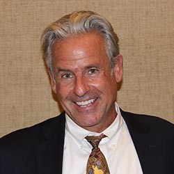 Hughes, Kirk T.